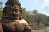 Asuras are usually seen in opposition to Devas (benevolent deities or angels).<br/><br/>

Angkor Thom is located one mile north of Angkor Wat. It was built in the late 12th century by king Jayavarman VII, and covers an area of 9 km², within which are located several monuments from earlier eras as well as those established by Jayavarman and his successors. At the centre of the city is Jayavarman's state temple, the Bayon, with the other major sites clustered around the Victory Square immediately to the north.<br/><br/>

Angkor Thom was established as the capital of Jayavarman VII's empire, and was the centre of his massive building programme. One inscription found in the city refers to Jayavarman as the groom and the city as his bride. Angkor Thom seems not to be the first Khmer capital on the site, however, as Yasodharapura, dating from three centuries earlier, was centred slightly further northwest. The last temple known to have been constructed in Angkor Thom was Mangalartha, which was dedicated in 1295. In the following centuries Angkor Thom remained the capital of a kingdom in decline until it was abandoned some time prior to 1609. It is believed to have sustained a population of 80,000-150,000 people.