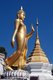 Thailand: A walking Buddha in the abhaya mudra or mudra of no fear position, Wat Salaeng, Ban Chom Khwan, Amphoe Long, Phrae Province